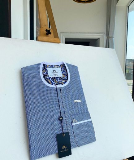 A blue and white windowpane check, front flap details African traditional senator kaftan native.