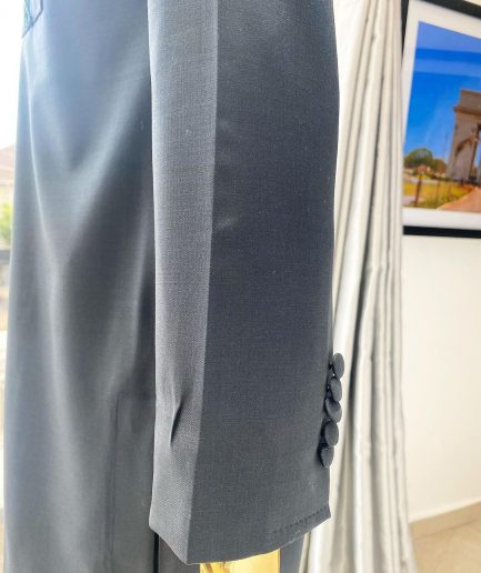 A Sacramento green “Suktan” Interwoven embroidery patch pocket and front flap, free suit hand sleeve details African traditional senator native.