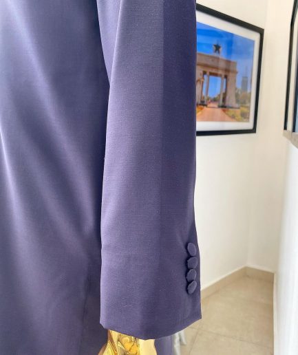 An eggplant purple “Suktan” shoulder drop embroidery and front flap, free suit hand sleeve details, African traditional senator native