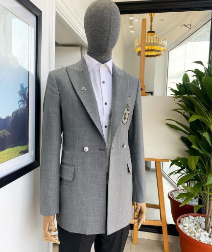 A Cloud Grey Peak Lapel, One button Double Breasted Suit.