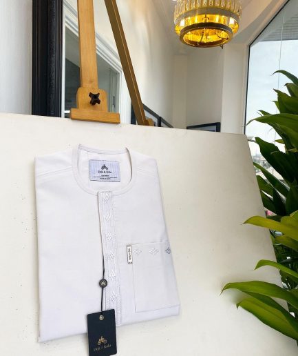 A bold stripe white, patch pocket front flap with embroidery details African traditional senator kaftan native