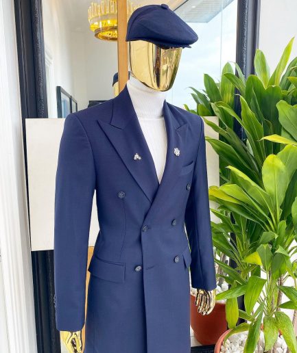 A reloaded “peaky Blinder” midnight blue peak lapel trench suit