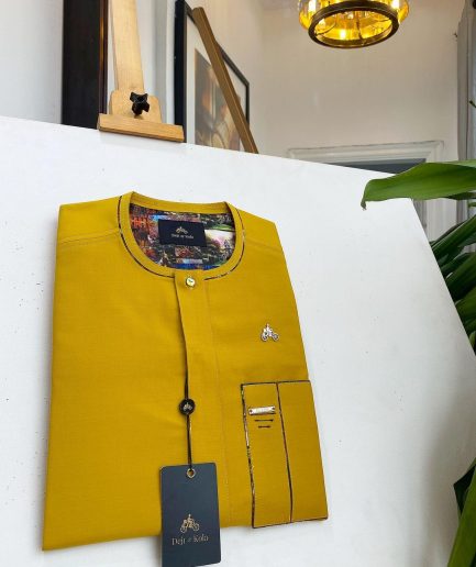 A honey yellow, clear view glass Swarovski buttons detailing African traditional senator kaftan native.