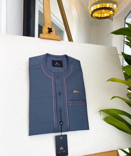 An Air Force blue, clear view Swarovski buttons and embroidery details African traditional senator kaftan native