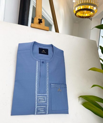 A Carolina blue, embroidery front flap, clear view Swarovski button, African traditional senator kaftan native.