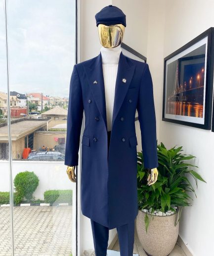 A reloaded “peaky Blinder” midnight blue peak lapel trench suit