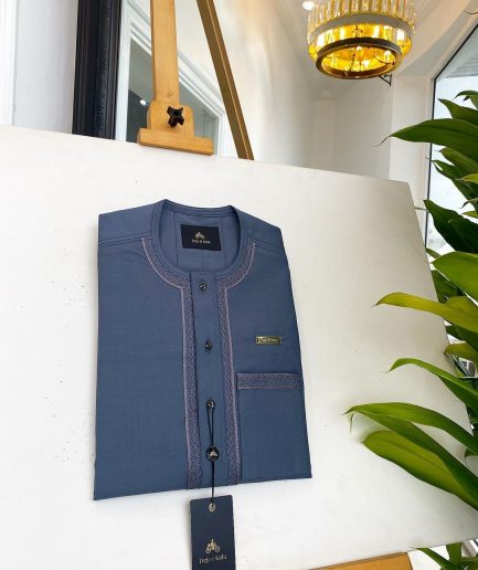 An Air Force blue, clear view Swarovski buttons and embroidery details African traditional senator kaftan native