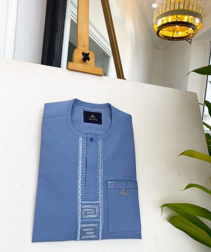 A Carolina blue, embroidery front flap, clear view Swarovski button, African traditional senator kaftan native.