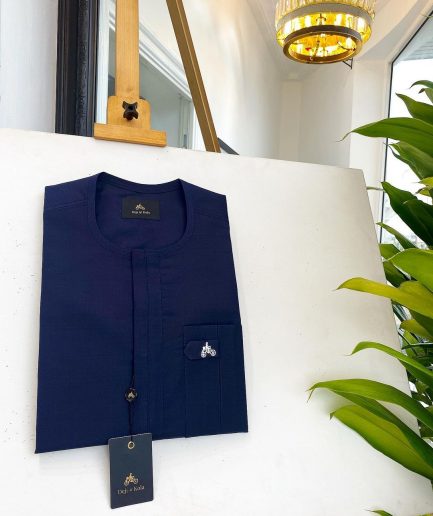 A midnight blue, front flap, combat design pocket African traditional senator kaftan native.