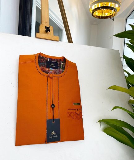 A Fire Orange, covered button, paisley design African traditional senator kaftan native.