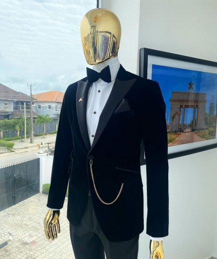 A Charcoal black peak lapel-soaked Italian velvet tuxedo suit