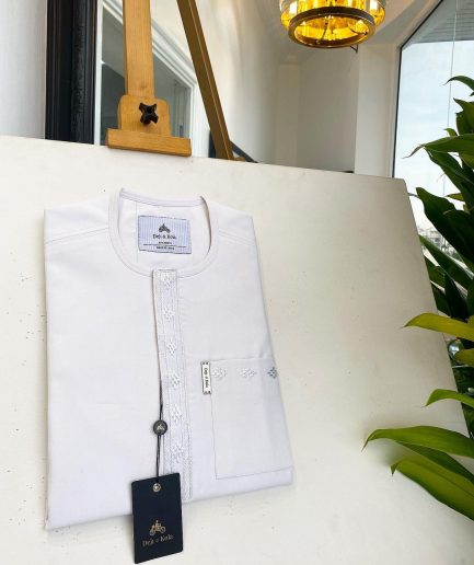 A bold stripe white, patch pocket front flap with embroidery details African traditional senator kaftan native