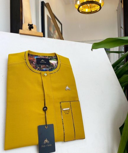 A honey yellow, clear view glass Swarovski buttons detailing African traditional senator kaftan native.
