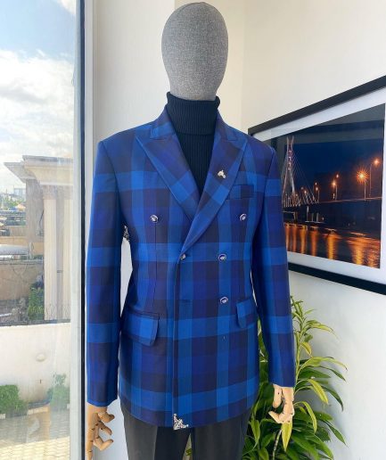 A multicolor shade of blue windowpane check double breasted Peak lapel suit