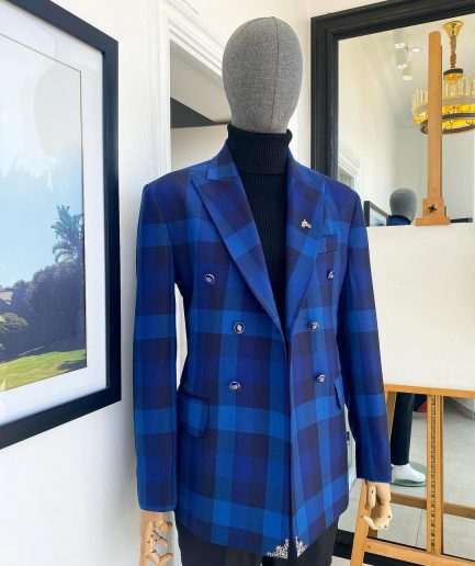 A multicolor shade of blue windowpane check double breasted Peak lapel suit