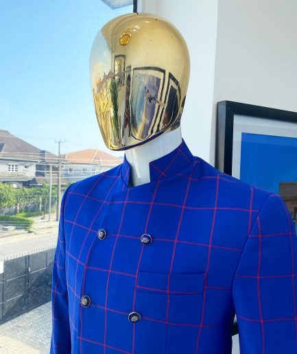 An Ultramarine blue and candy red “preachers” double breasted safari suit