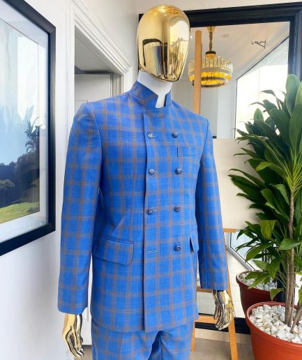 An Azure blue and apricot orange glen check “preacher” double breasted safari suit