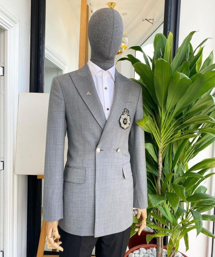 A Cloud Grey Peak Lapel, One button Double Breasted Suit.