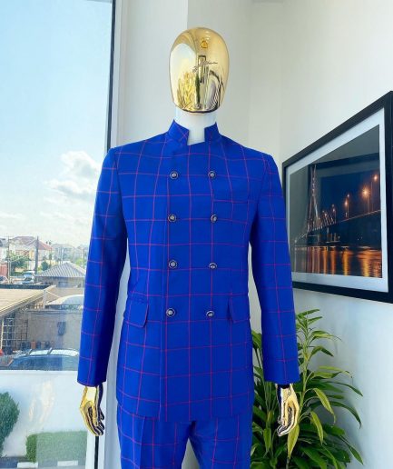 An Ultramarine blue and candy red “preachers” double breasted safari suit