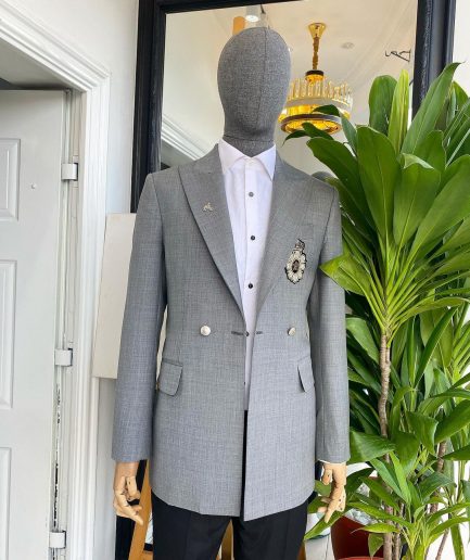 A Cloud Grey Peak Lapel, One button Double Breasted Suit.