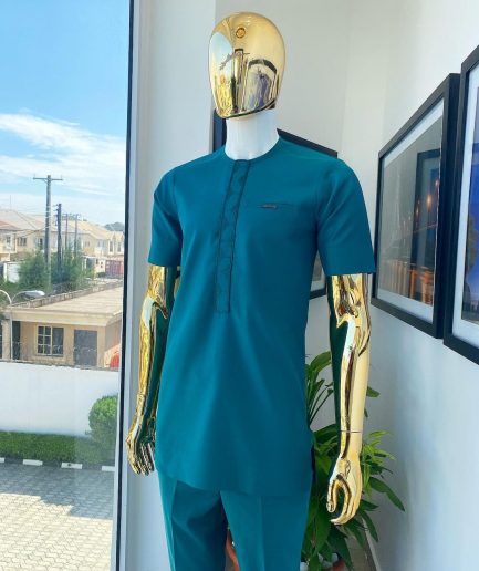 An emerald green embroidery detailing African traditional senator kaftan native