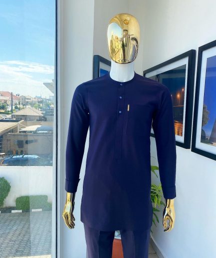 An Eggplant purple, front flap, blue clear view glass Swarovski buttons detailing African traditional senator kaftan native