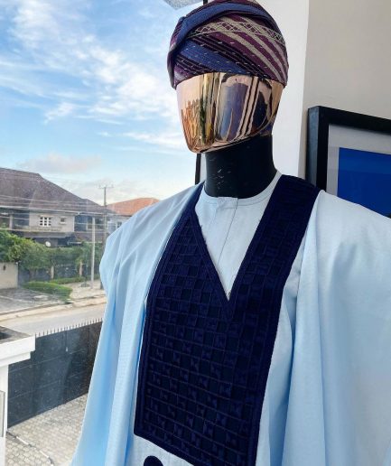 A Light blue, connected square navy blue embroidery Agbada