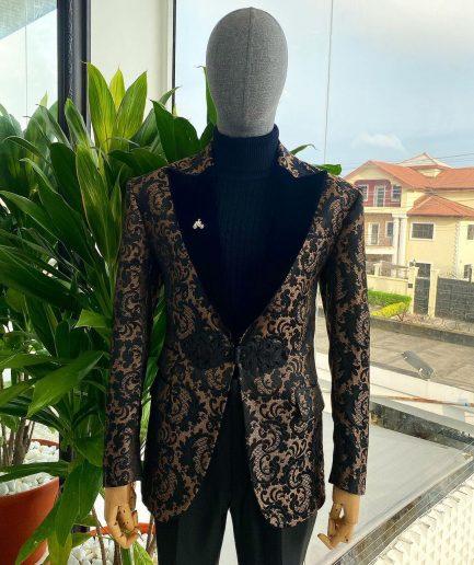 A “Mandarin” Peak Lapel with black soaked Italian velvet, Chinese button suit