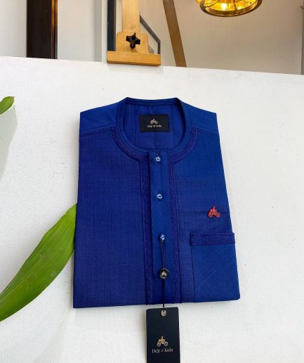 An Admiral Blue, clear view blue Swarovski buttons, edge embroidery, pocket details African traditional senator kaftan native.