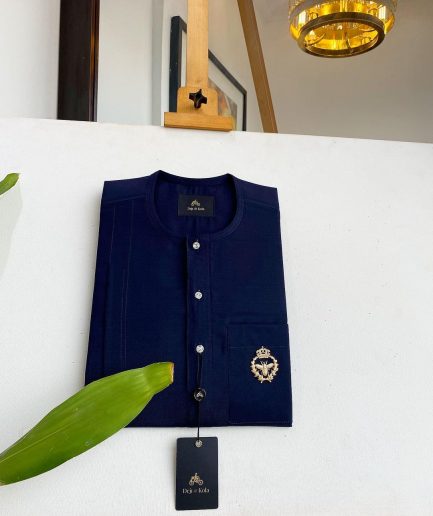 A Midnight Blue, clear view silver Swarovski buttons, gold bee adornment green pocket details African traditional senator kaftan native.