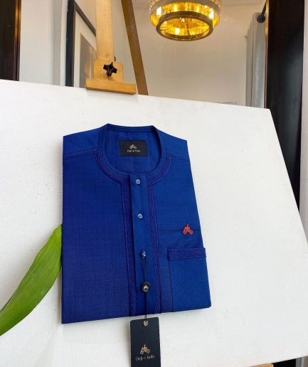An Admiral Blue, clear view blue Swarovski buttons, edge embroidery, pocket details African traditional senator kaftan native.