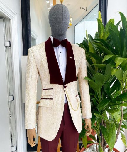 A “Mandarin” dispersed gold ruffle pattern burgundy shawl lapel jacquard suit