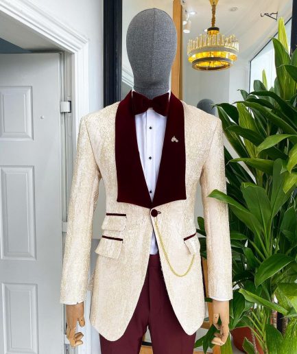 A “Mandarin” dispersed gold ruffle pattern burgundy shawl lapel jacquard suit