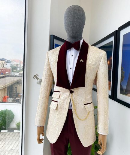 A “Mandarin” dispersed gold ruffle pattern burgundy shawl lapel jacquard suit