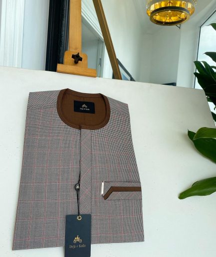 A Light and dark brown check, front flap and sliding pocket details African traditional kaftan native.