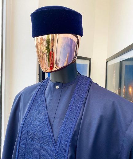 A Midnight Blue Agbada with a maze line Japanese intersection design, senator kaftan with Swarovski button details and sokoto
