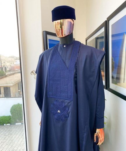 A Midnight Blue Agbada with a maze line Japanese intersection design, senator kaftan with Swarovski button details and sokoto