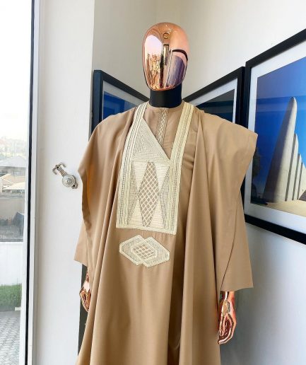 A Tortilla Brown, interconnected embroidery details agbada, buba and sokoto