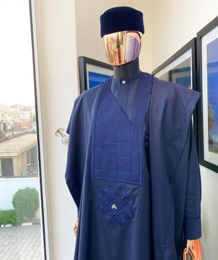A Midnight Blue Agbada with a maze line Japanese intersection design, senator kaftan with Swarovski button details and sokoto