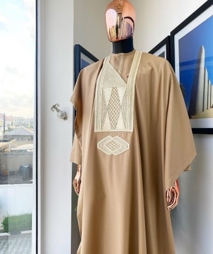 A Tortilla Brown, interconnected embroidery details agbada, buba and sokoto