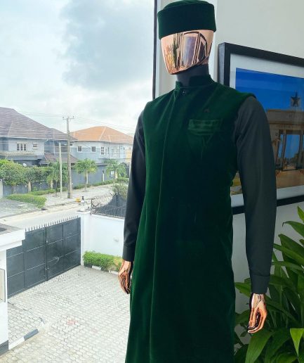 A monochrome forest green long senator kaftan, Soaked premium velvet kimono with Black Swarovski button details & matching velvet round cap.