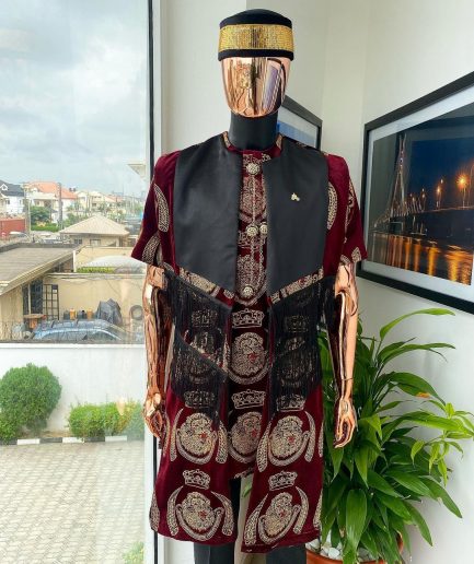 A burgundy Reloaded “isiagu” African traditional Wear with pant trouser