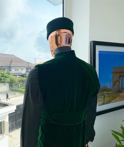 A monochrome forest green long senator kaftan, Soaked premium velvet kimono with Black Swarovski button details & matching velvet round cap.
