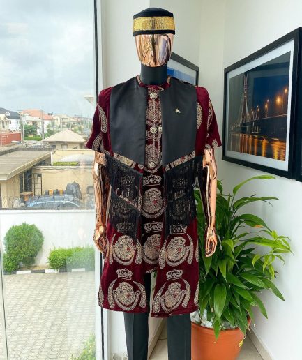 A burgundy Reloaded “isiagu” African traditional Wear with pant trouser