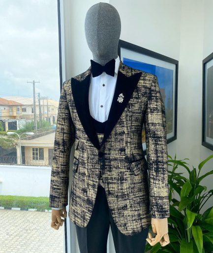 A “Mandarin” Dispersed Black and Gold Peak Lapel Suit