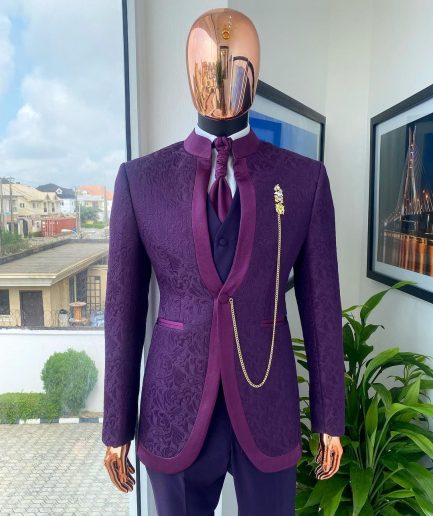 A “Pope” tapeless eggplant purple single button bishop neck suit