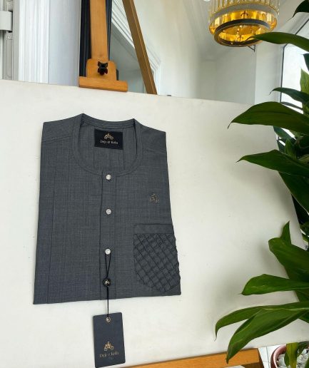 An Iron grey, front flap, and ruffle pockets with silver Swarovski button detail African traditional senator Kaftan native.