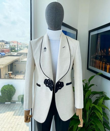 A Gold and ivory “Mandarin” invisible Pattern Ivory white shawl lapel jacquard Suit