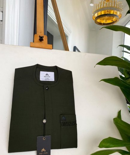 An Olive Green, Tiny Flap with Swarovski button details African traditional senator kaftan native.