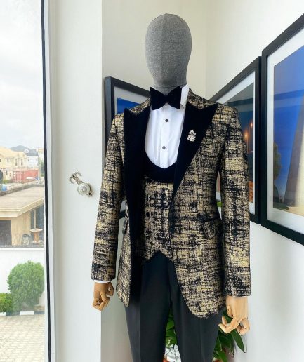 A “Mandarin” Dispersed Black and Gold Peak Lapel Suit